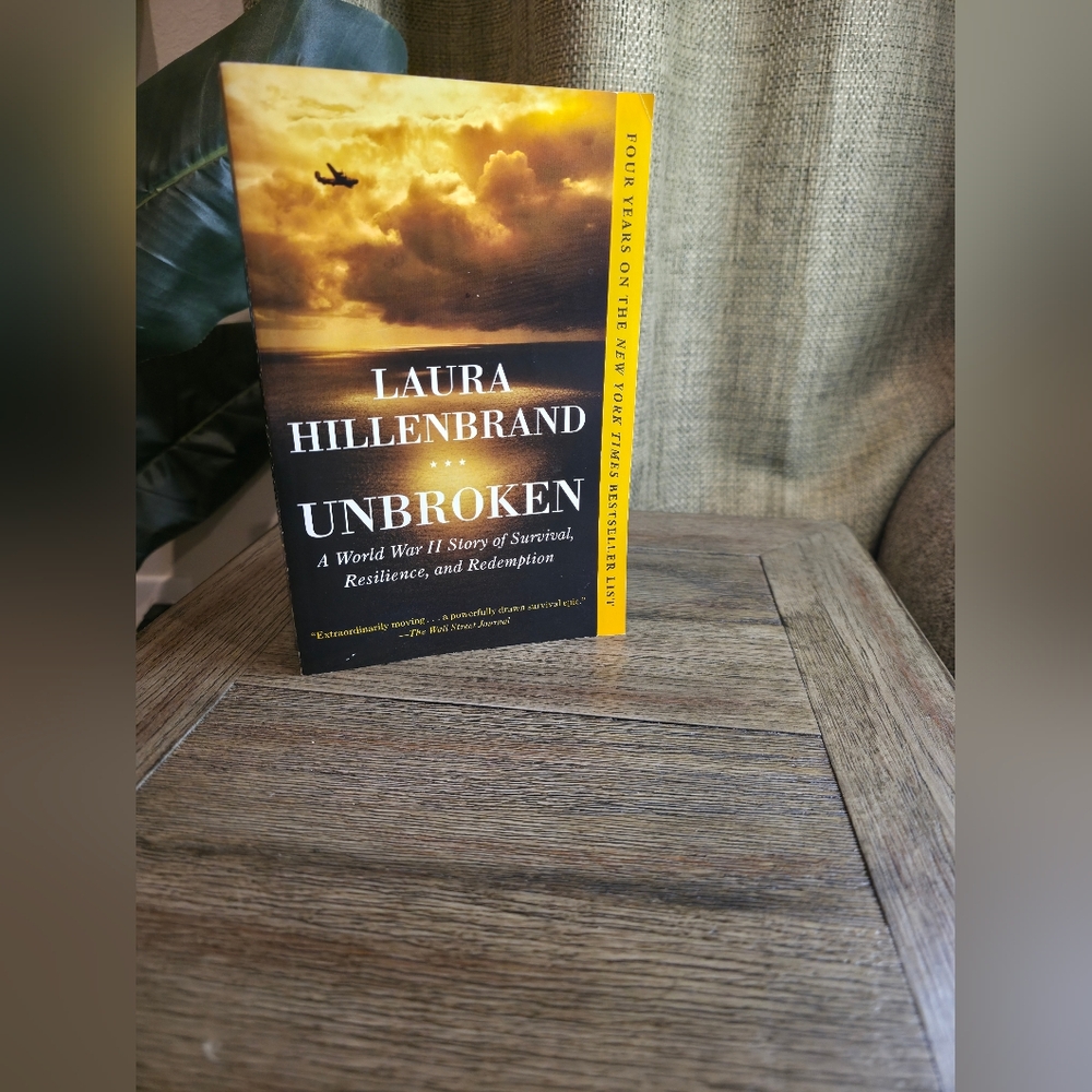 Unbroken by Laura Hillenbrand - Yellow & Black Paperback.